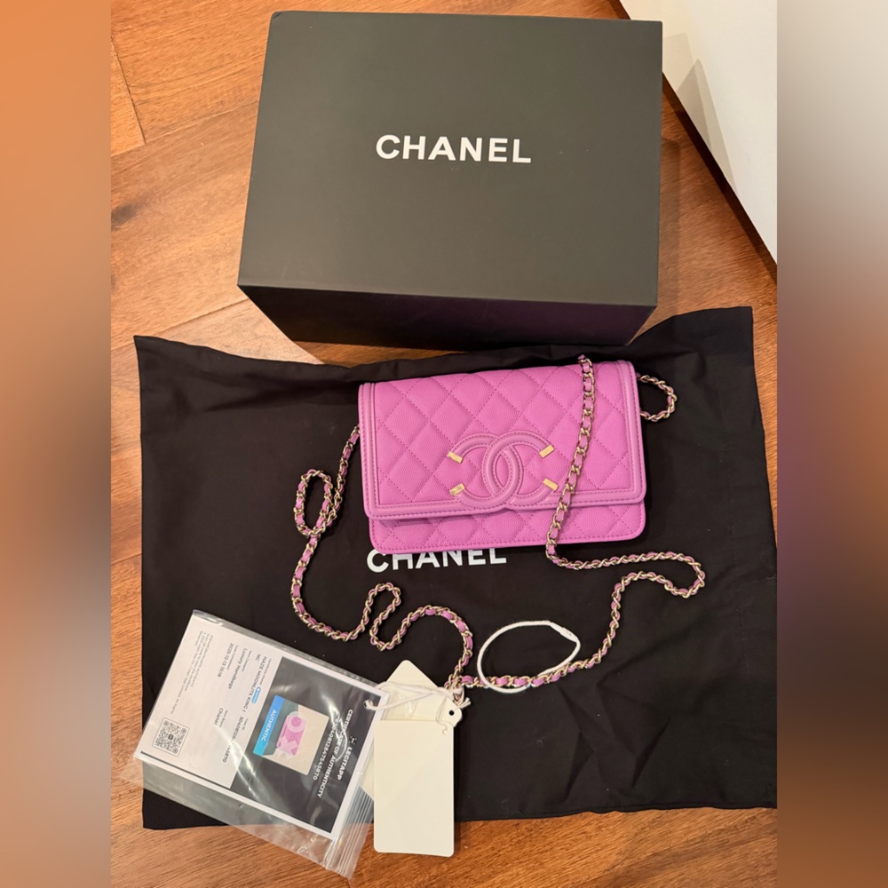 Chanel Purple Quilted Crossbody Bag in caviar. A+ condition